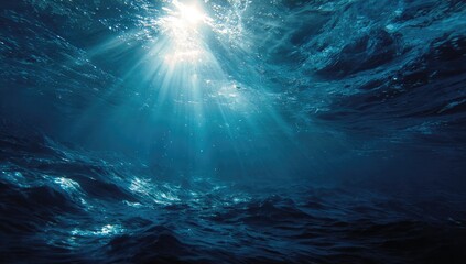 Sunlight beams through deep ocean water