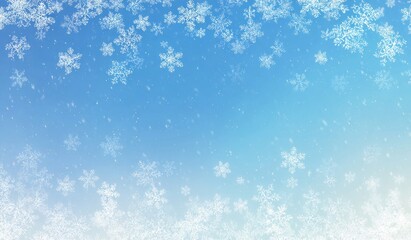 Light snowflakes falling on a soft blue sky