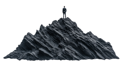 Businessman standing on top of a mountain peak