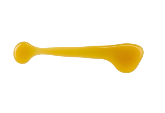 Yellow blob of liquid on transparent backdrop