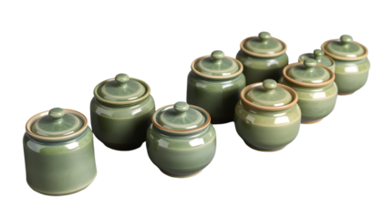 Collection of Green Ceramic Jars with Lids