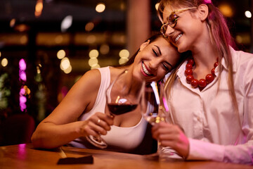 Close Friends Enjoying a Wine Night Together With Genuine Laughter and Smiles