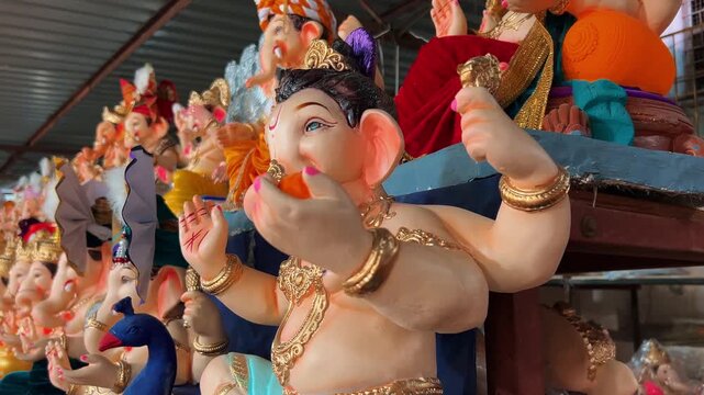 Indian Festival Stock Footage &ndash; Beautiful Ganesh Idols and Murtis for Ganesh Chaturthi Celebrations in India, Showcasing Traditional Art, Spiritual Devotion, and Festive Atmosphere