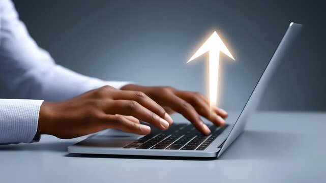 Hands engage with laptop keyboard creating a sense of productivity and innovation. Modern workspace atmosphere with neutral background. Concept of technology, digital marketing, software development