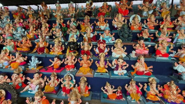 Indian Festival Stock Footage &ndash; Beautiful Ganesh Idols and Murtis for Ganesh Chaturthi Celebrations in India, Showcasing Traditional Art, Spiritual Devotion, and Festive Atmosphere