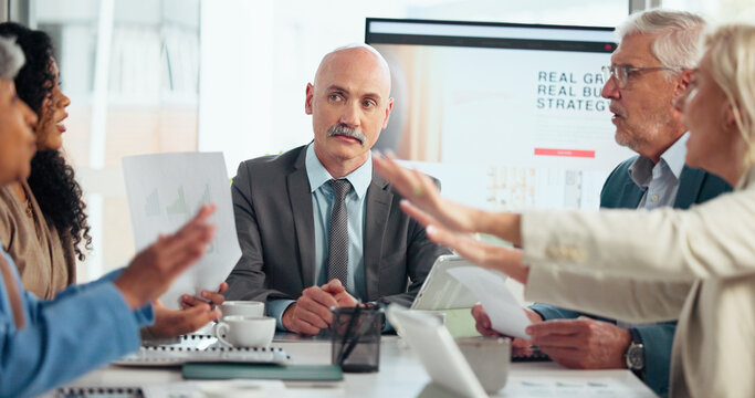 Discussion, documents and meeting with business people in office boardroom for growth or strategy. Conversation, disagreement and paperwork with employee team in workplace for conflict resolution