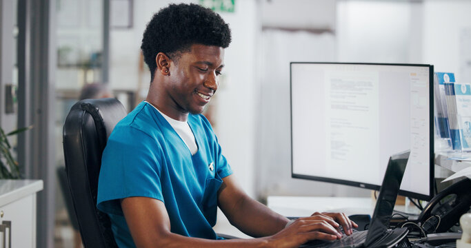 Black man, nurse and typing with laptop for online booking, administration or medical appointment. African person, smile and health admin with computer at front desk for planning visit or schedule