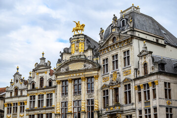 Fototapeta premium Lavishly decorated facades and architectural details of Guildhalls on the Grand-Place Grote Markt square of Brussels, Belgium