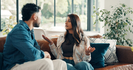 Couple, living room and argument with mistake, stress and drama in home or apartment. Frustrated,...