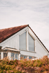 White suburban houses with contrasting roof designs
