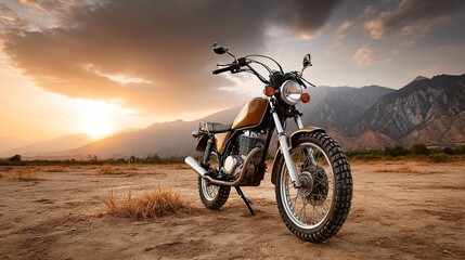 Fototapeta premium Vintage motorcycle at sunset in desert landscape