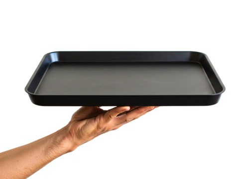 Hand holding a black serving tray isolated on transparent background