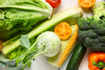 Different fresh vegetables on white background, closeup