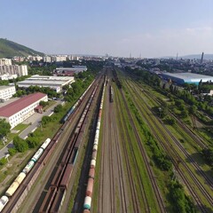 Aerial view of train yard and city