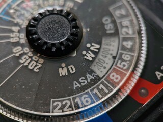 Vintage Camera Dial CloseUp of ASA ISO and Aperture Settings.