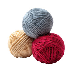 A trio of yarn balls in various colors, isolated on transparent background