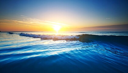 Sunrise over ocean waves