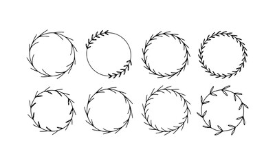 Simple black and white wreath designs showcasing various circular shapes and leaf patterns in a minimalist style