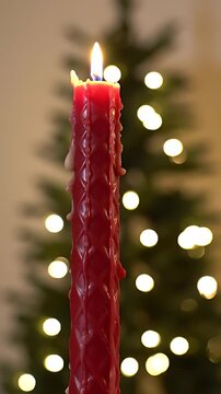 Advent candle time lapse: a large, festive candle slowly burns down daily, symbolizing the passage of time towards Christmas.