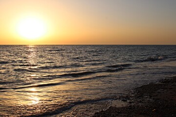 Sunset on the beach of las Tres Piedras in Chipiona, Cádiz. Spain
