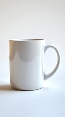 Fototapeta premium White ceramic mug on a light background, simple design for sublimation mockups