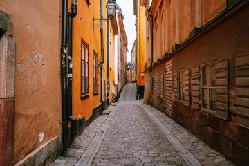 Quaint narrow cobblestone streets in Gamla Stan - Stockholm, Sweden