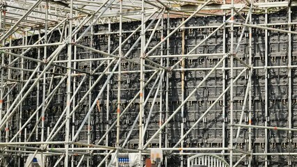 Workers installing large led screen wall for a concert - Powered by Adobe