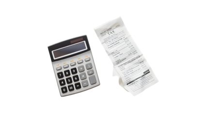 A calculator and a receipt showing tax calculations on a black background from above angle