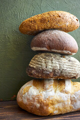 Rustic artisan bread series with whole loaves and sliced bread on wooden boards and tables. Farmhouse bakery style with natural textures, organic ingredients, and cozy slow food aesthetic