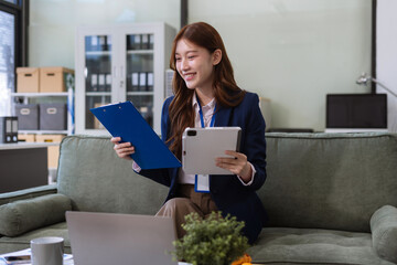 Email notification concept, Female use smartphone and laptop receive message alert in the mailbox.