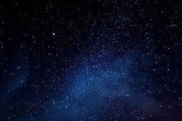 Deep night sky, scattered stars, and faint nebulae