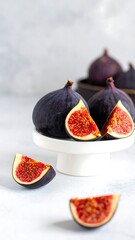 Figs Sliced on Pedestal, White Surface