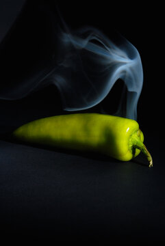 Sri lankan Fresh Hot and Smoky Green Capsicum (Chili Pepper) isolated on Black Background &ndash; Spicy Food Concept