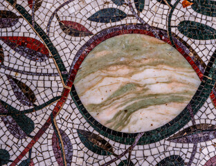 Mosaic of ancient Rome in close-up.