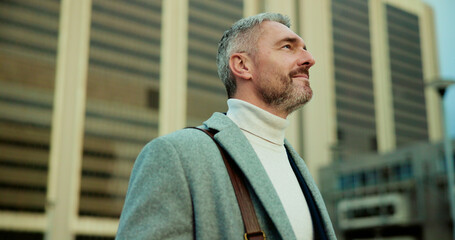 Thinking, employee and man in city, travel or urban planner with pride for career or job opportunity. Morning, commuter and mature person with ambition for property development, reflection and vision © peopleimages.com