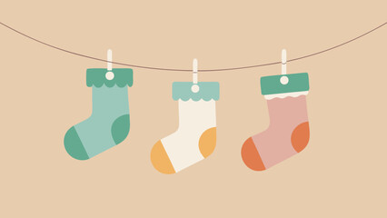 Three socks hanging from a line with clothespins in pastel colors on a light brown background design