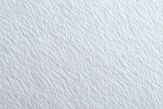 Smooth, textured, off-white surface with subtle ridges