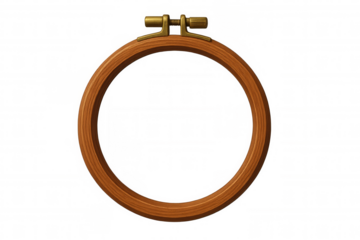 Wooden embroidery hoop with brass adjustment screw, positioned for needlework crafting against transparent backdrop