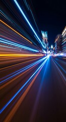 Streaks of light paint a dynamic cityscape at night, conveying speed and motion.