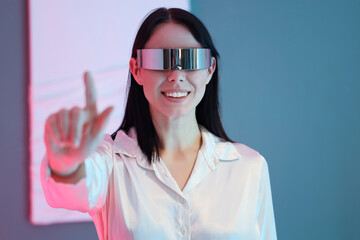 Young woman using VR glasses in modern art gallery, closeup
