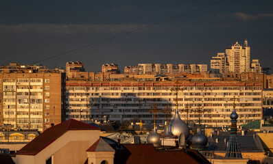 Multi-storey residential buildings at sunset in the center of the Russian capital.