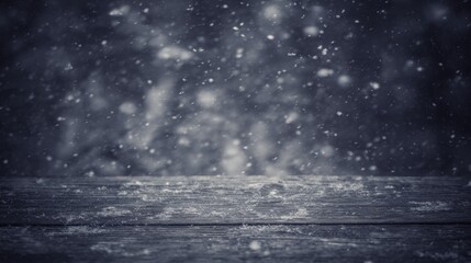 Snow-covered wooden surface with falling snowflakes, evoking a serene winter atmosphere.