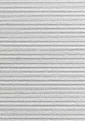 Close-up of textured, white, horizontal ribbed surface