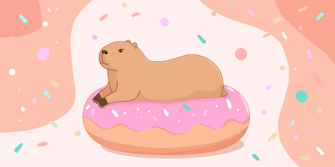 Naklejka premium Adorable brown capybara lounging on a sweet pink donut with colorful sprinkles.