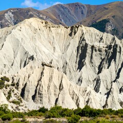Dramatic mountain face with light and dark layers