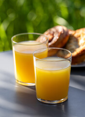 two glasses of orange juice