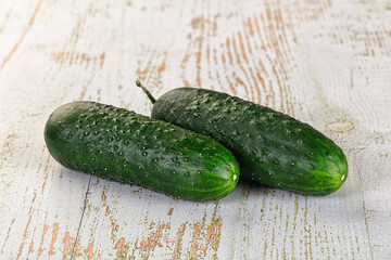 Ripe green raw two cucumbers