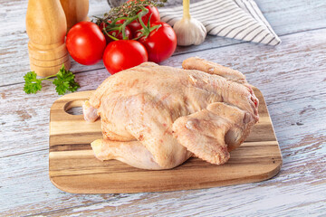 Raw whole uncooked organic chicken