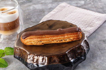 Gourmet chocolate eclair with icing