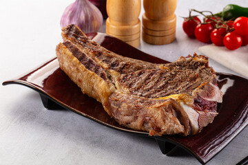 Grilled ribeye beef steak with bone